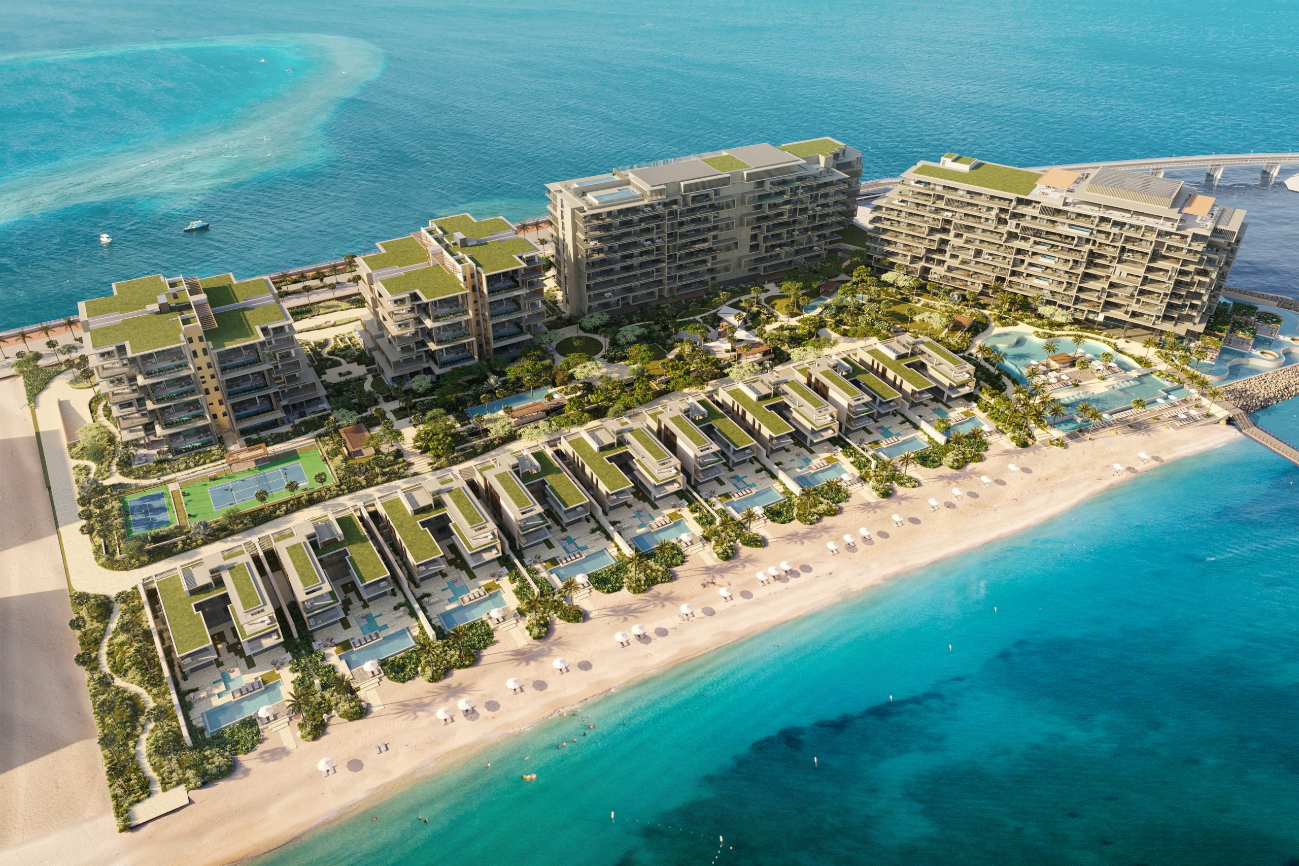 Aerial view of Six Senses Residences The Palm Dubai, beachfront pools and Dubai skyline — ALMAS Hospitality luxury development advisory