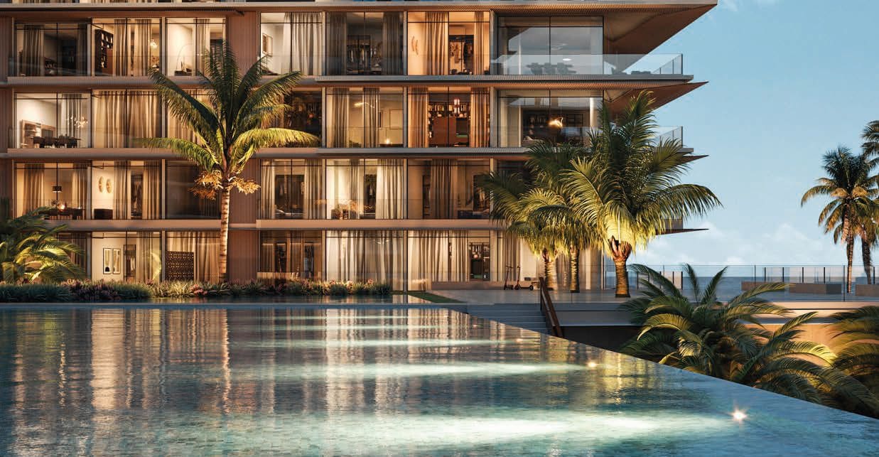 Rixos Dubai Islands hotel and residences at dusk, waterfront pool terrace — ALMAS Hospitality luxury development advisory