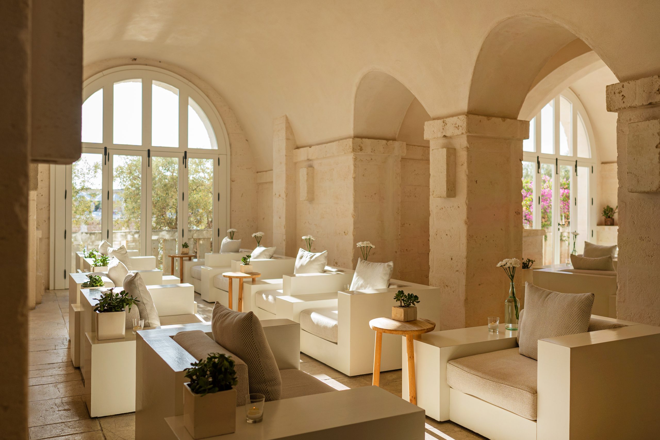 Borgo Egnazia, the Bar del Portico under stone arches at the luxury resort in Puglia, Italy